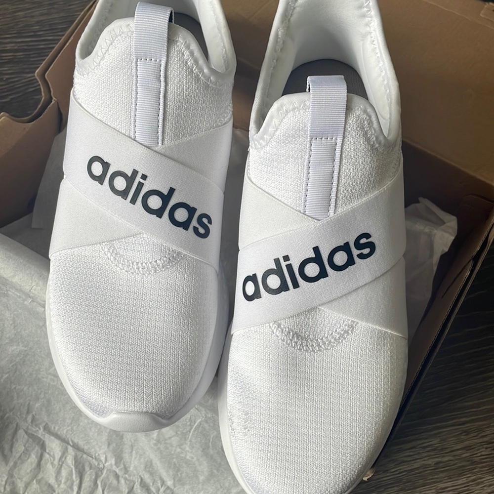 White cross running sneakers